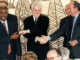Then French prime minister Lionel Jospin (centre) shakes hands