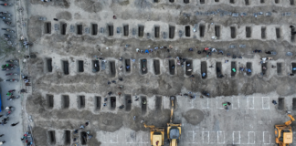 This illegal US-Israeli attack on Iran is also an assault on the United Nations Mourners dig graves for the funeral of 170 children killed in a US-Israeli strike on a primary school