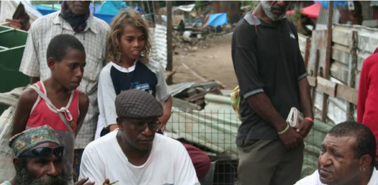 Shattered homes . . . community leaders at Port Moresby's Paga Hill settlement