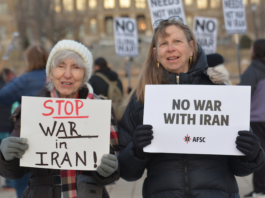 Community members in Iowa protest against the US-Israeli war on Iran