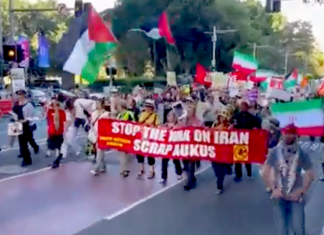 Epstein cabal play games with human lives in Iran while grasping for unearned riches A Sydney protest against the US-Israeli war on Iran