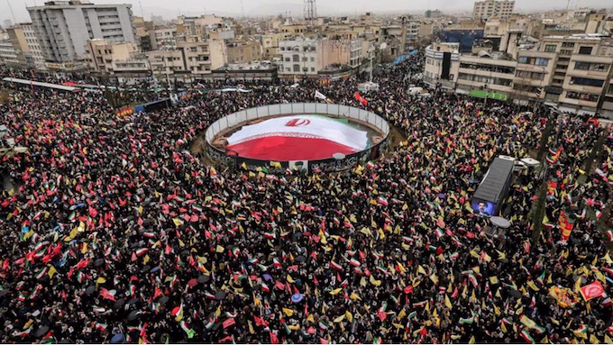 Huge crowds of Iranians were defiantly on the streets in the capital Tehran in spite of the bombing 