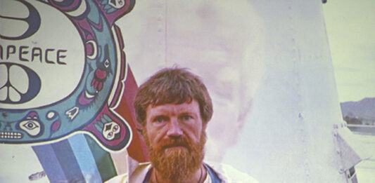 Author and journalist Dr David Robie speaking at the launch of the third edition of the Rainbow Warrior book Eyes of Fire