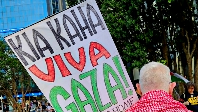 A protester at the Anzac Day rally in Auckland Tamaki Makaurau today