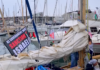 Global Sumud Flotilla heads from Barcelona to break Gaza blockade A "New Zealand government must sanction Israel" banner flutters on one of the Global Sumud Flotilla boats