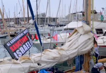 Global Sumud Flotilla heads from Barcelona to break Gaza blockade A "New Zealand government must sanction Israel" banner flutters on one of the Global Sumud Flotilla boats