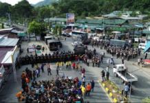 Indonesian security forces crack down on a Papuan protest over the Puncak massacre