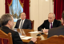 Iranian Foreign Minister Abbas Araghchi meets with Russian President Vladimir Putin