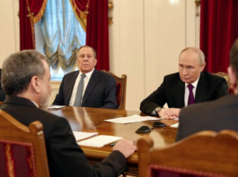 Iranian Foreign Minister Abbas Araghchi meets with Russian President Vladimir Putin