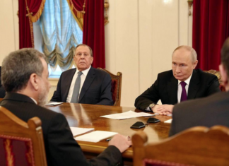 Iranian Foreign Minister Abbas Araghchi meets with Russian President Vladimir Putin