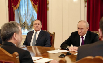 Iranian Foreign Minister Abbas Araghchi meets with Russian President Vladimir Putin