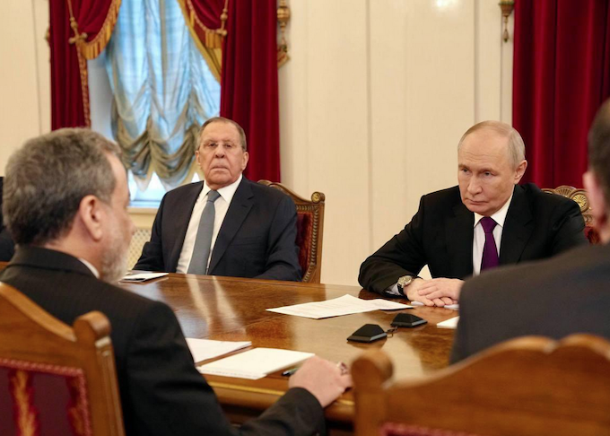 Iranian Foreign Minister Abbas Araghchi meets with Russian President Vladimir Putin