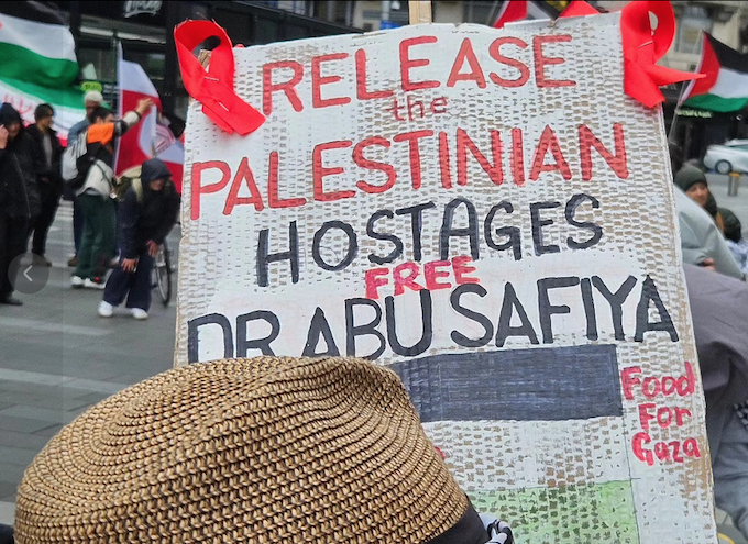 "Release the Palestinian hostages - Free Dr Abu Safiya" 