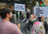 Protesters at a New Zealand rally against the US-Israel war on Iran and the Israeli genocide in Gaza