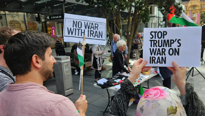 Protesters at a New Zealand rally against the US-Israel war on Iran and the Israeli genocide in Gaza