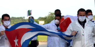 The world owes Cuba a debt – and the US a condemnation Cuban doctors arriving back from Italy following the covid outbreak in 2020
