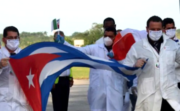The world owes Cuba a debt – and the US a condemnation Cuban doctors arriving back from Italy following the covid outbreak in 2020