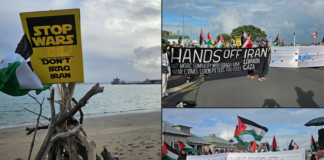 "Hands off Iran" . . . New Zealand protesters make their voices heard in opposition to the Israeli genocide in Gaza and the war on Iran near Devonport Naval Base in Auckland