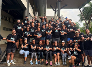 Fiji media workers of the Fijian Media Association celebrate a belated World Press Freedom Day in the capital Suva