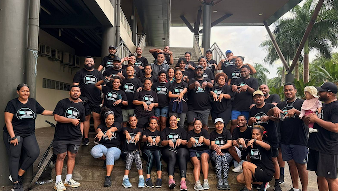 Fiji media workers of the Fijian Media Association celebrate a belated World Press Freedom Day in the capital Suva