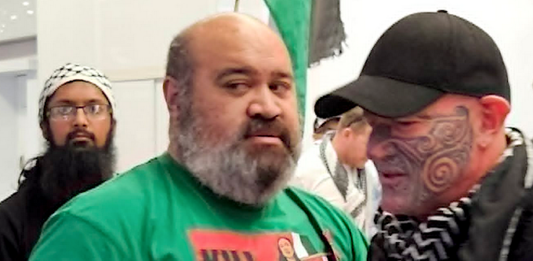 Gaza freedom flotilla activist Hāhona Ormsby (right) being welcomed home at Auckland International Airport on Sunday