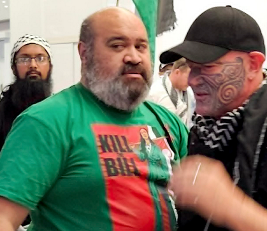 Gaza freedom flotilla activist Hāhona Ormsby (right) being welcomed home at Auckland International Airport on Sunday