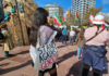 "I stand against genocide" placard at a Stop Wars protest in Auckland's Aotea Square last month