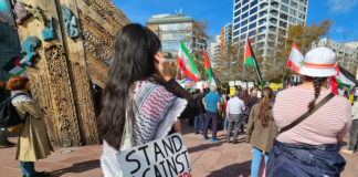 "I stand against genocide" placard at a Stop Wars protest in Auckland's Aotea Square last month