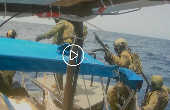 Israeli navy officers boarding a Gaza flotilla boat