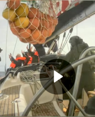 Israeli soldiers board a Gaza-bound humanitarian aid flotilla vessel and hold the crew at gunpoint