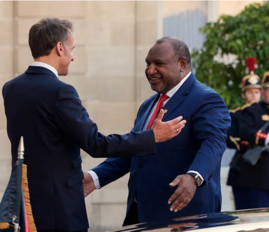 PNG prime minister visits France, plans to open Paris embassy French President Emmanuel Macron and Papua New Guinea PM James Marape meeting