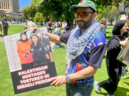 Australian protesters condemn the torture of Palestinian prisoners held in Israeli jails at a demonstration in Adelaide, South Australia, in December 2025