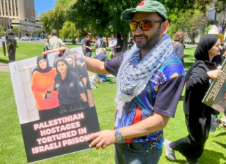 Australian protesters condemn the torture of Palestinian prisoners held in Israeli jails at a demonstration in Adelaide, South Australia, in December 2025