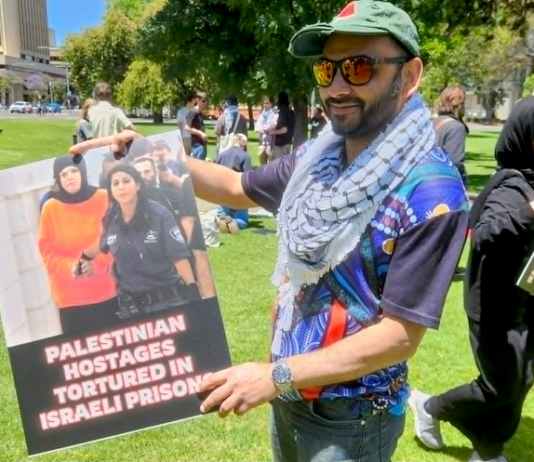 Australian protesters condemn the torture of Palestinian prisoners held in Israeli jails at a demonstration in Adelaide, South Australia, in December 2025