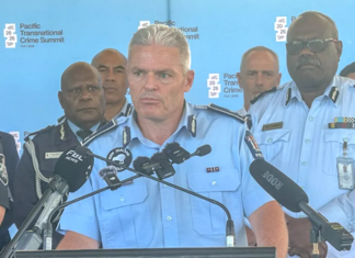 New Zealand Police Commissioner Richard Chambers flanked by regional police chiefs and Commissioner Rusiate Tudravu