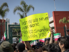 Fans bid farewell to the Iranian team’s players outside their hotel in Tijuana, Mexico