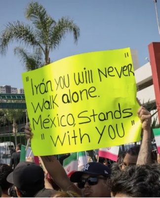 Fans bid farewell to the Iranian team’s players outside their hotel in Tijuana, Mexico