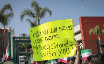 Fans bid farewell to the Iranian team’s players outside their hotel in Tijuana, Mexico