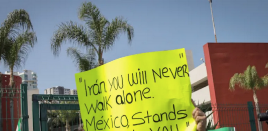 Fans bid farewell to the Iranian team’s players outside their hotel in Tijuana, Mexico