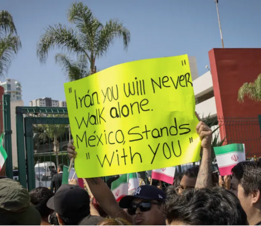 Fans bid farewell to the Iranian team’s players outside their hotel in Tijuana, Mexico
