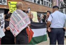 Fiji police questioning protesters at the pro-Palestine picket across the street from the new Israeli Embassy in Suva being officially opened today