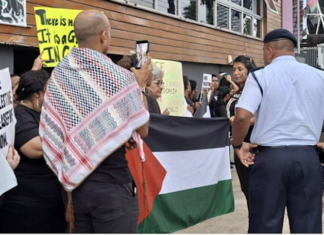 Fiji police questioning protesters at the pro-Palestine picket across the street from the new Israeli Embassy in Suva being officially opened today