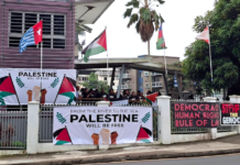 Kanaky, Palestinian and West Papua flags flying at the Fiji Women's Crisis Centre last week during a protest against the opening of the Israeli Embassy in Suva