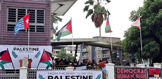Kanaky, Palestinian and West Papua flags flying at the Fiji Women's Crisis Centre last week during a protest against the opening of the Israeli Embassy in Suva