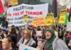 “Palestine - 78 years of [Israeli] terror” and "Aroha trumps arms" banners at the Auckland June 20 March for Peace