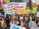 “Palestine - 78 years of [Israeli] terror” and "Aroha trumps arms" banners at the Auckland June 20 March for Peace