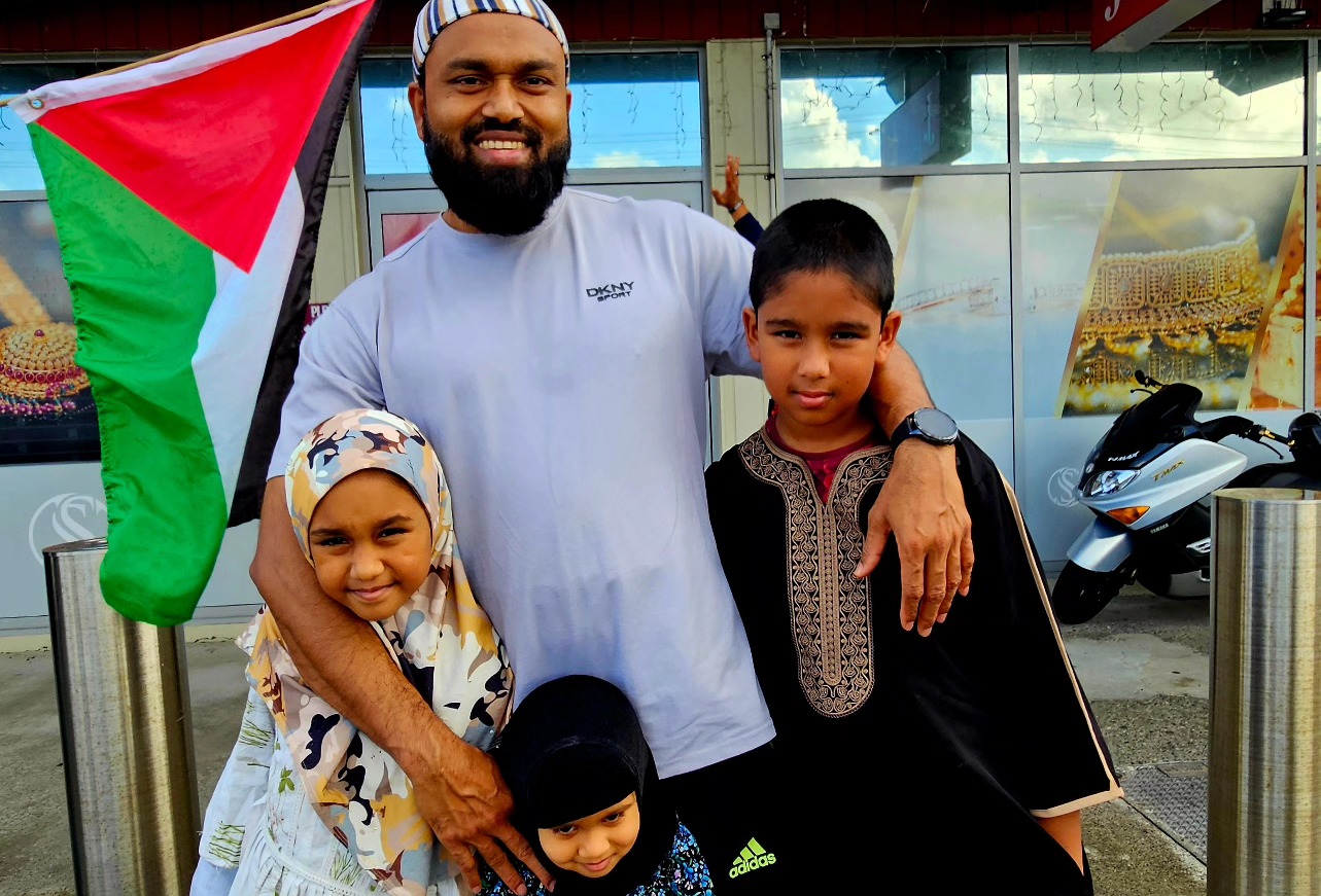 A local family at the Palestine protest outside the Fiji Consulate in Auckland 