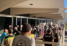 Nouméa voters queue at the Town Hall after polling places opened