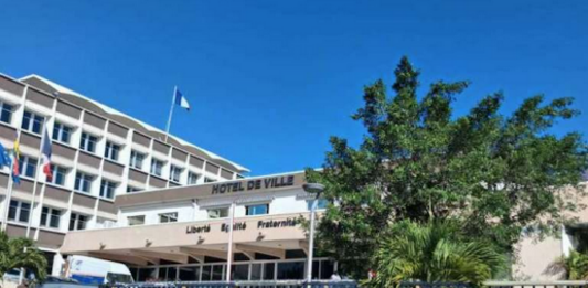 Political party posters on display at the Nouméa Town Hall