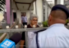 Fiji police talk to a Palestine protest organiser, Fiji Women's Crisis Centre coordinator Shamima Ali